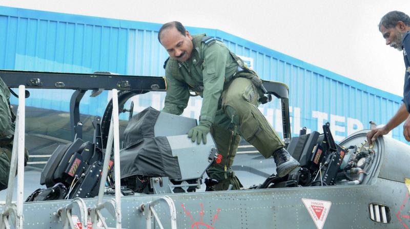 airchiefmarshalrahatakehismaidenflightinlightcombataircrafttejas